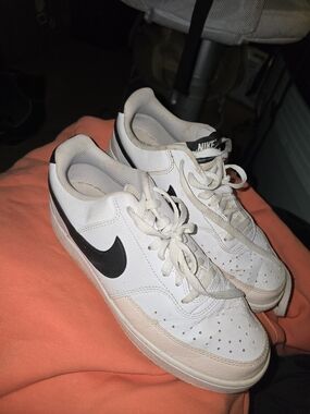 Nike White Leather Sneakers with Black Swoosh
